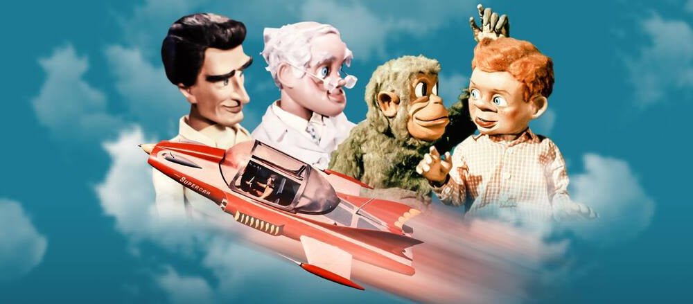 Mike Mercury, Professor Popkiss, Doctor Beaker and Jimmy Gibson with Supercar