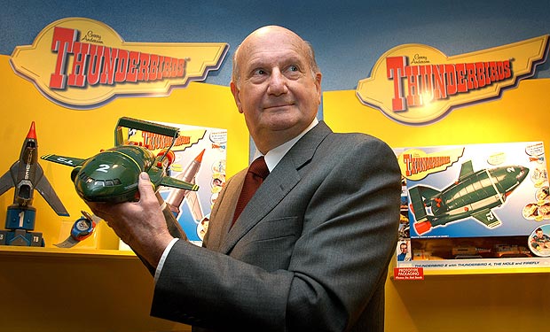 Gerry Anderson holding a Thunderbird 2 model